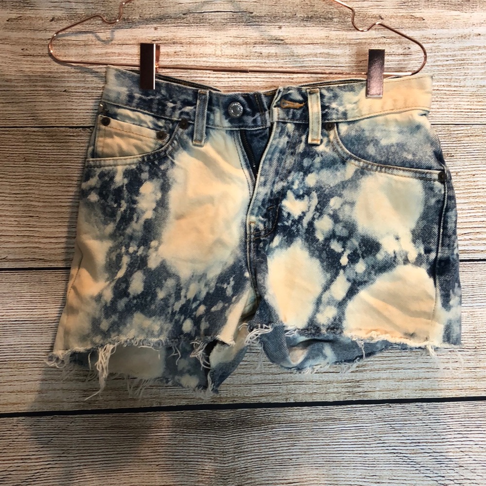 Acid washed. Distressed. Embellished Levi shorts